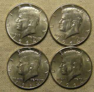 For your consideration is this collection of four silver Kennedy 