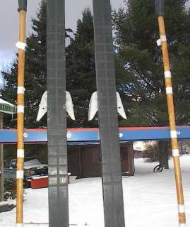 The skis measures 57 (150 cm) long. Have 3 pin 75 mm bindings. The 