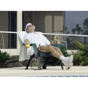  Man Relaxing with a Beer After His Tennis Match Premium 