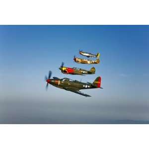  A P 36 Kingcobra, Two Curtiss P 40N Warhawks, and a P 51D 