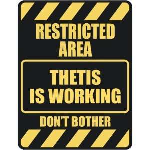   RESTRICTED AREA THETIS IS WORKING  PARKING SIGN