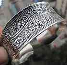 Surprising carved Totem cuff bracelet  