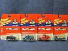 Lot of 4 Johnny Lightning Die Cast Cars 2 Ford 2 Chevy  