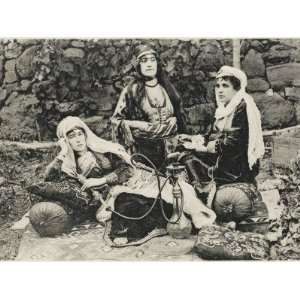 Three Caucasian Women in Traditional Costume, Relaxing with a Hookah 
