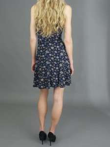 Criss Cross Dress in Black Floral Combo. SLeeveless Dress with Criss 