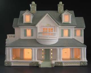 Xmas Easter Village Lighted Ceramic House sold on   