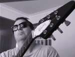 This is me with my 1990 Gibson Flying V. I love it