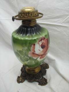 nice antique oil or fluid lamp with glass base painted with roses 