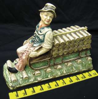 antique bisque figurine old man & log sled 12 no mark  