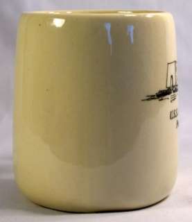 This is a pottery mug with the U.S.S. Arizona Memorial Pearl Harbor 