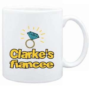 Mug White  Clarkes fiancee  Last Names  Sports 
