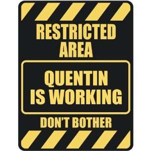   RESTRICTED AREA QUENTIN IS WORKING  PARKING SIGN