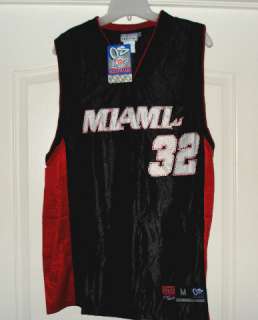 MARIO CHALMERS AUTOGRAPHED BASKETBALL + FREE MIAMI HEAT JERSEY